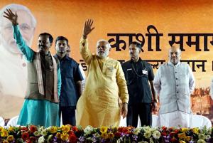 Prime Minister Narendra Modi with BJP president Amit Shah waves at crowd during an election rally in Varanasi on Sunday.(PTI File Photo) Prime Minister Narendra Modi with BJP president Amit Shah waves at crowd during an election rally in Varanasi on Sunday.(PTI File Photo)