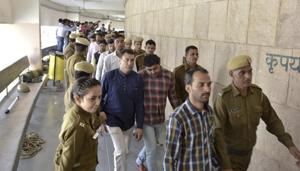 Police take the 2012 Maruti case convicts into custody at a district court in Gurgaon on Friday.(Sanjeev Verma/HT PHOTO) Police take the 2012 Maruti case convicts into custody at a district court in Gurgaon on Friday.(Sanjeev Verma/HT PHOTO)