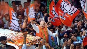 BJP president Amit Shah waves at party workers on his arrival at the party headquarters, in New Delhi.(PTI Photo) BJP president Amit Shah waves at party workers on his arrival at the party headquarters, in New Delhi.(PTI Photo)