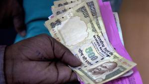 Banks received about Rs 1.13-lakh crore from customers without valid documents after demonetisation.(AP File Photo) Banks received about Rs 1.13-lakh crore from customers without valid documents after demonetisation.(AP File Photo)