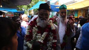 Asif Nizami, the head priest, and his nephew Nazim Nizami reached the Hazrat Nizamuddin Aulia Dargah soon after they arrived at IGIA on Monday.(HT Photo) Asif Nizami, the head priest, and his nephew Nazim Nizami reached the Hazrat Nizamuddin Aulia Dargah soon after they arrived at IGIA on Monday.(HT Photo)