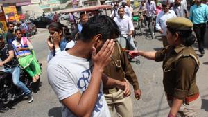 Police question men outside RGPG College for Women in Meerut on Wednesday. Across 11 districts of Uttar Pradesh, cops have hit the streets to carry out a drive against ‘Romeos’ on the orders of newly sworn-in CM Yogi Adityanath.(Chahatram/HT photo) Police question men outside RGPG College for Women in Meerut on Wednesday. Across 11 districts of Uttar Pradesh, cops have hit the streets to carry out a drive against ‘Romeos’ on the orders of newly sworn-in CM Yogi Adityanath.(Chahatram/HT photo)