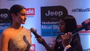 <p>Alia Bhatt seemed to be excited to wear silver on the red carpet as she was doing so after a while. She wore a dress by Reem Acra and it was the first time the designer's clothes were being worn in India. Alia's advice for style was --not to do anything uncomfortable because it is bound to show. She also expressed her admiration for Kangana's personality, Bebo's divaness and Deepika's poise. </p>
