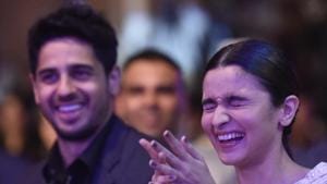 Sidharth Malhotra and Alia Bhatt share a light moment during the HT Most Stylish awards in Mumbai on Friday.(Kunal Patil/HT Photo) Sidharth Malhotra and Alia Bhatt share a light moment during the HT Most Stylish awards in Mumbai on Friday.(Kunal Patil/HT Photo)