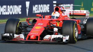 Ferrari's German driver Sebastian Vettel speeds down the main straight on the way to winning the Formula One Australian Grand Prix in Melbourne on Sunday.(AFP) Ferrari's German driver Sebastian Vettel speeds down the main straight on the way to winning the Formula One Australian Grand Prix in Melbourne on Sunday.(AFP)