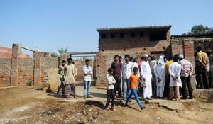 Butchers and traders along with family members gather outside a closed slaughterhouse in Naini, Allahabad, on March 21. Hundreds of ‘illegal’ slaughterhouses have shut down in the state over the past week since Yogi Adityanath took over as chief minister.(AFP photo) Butchers and traders along with family members gather outside a closed slaughterhouse in Naini, Allahabad, on March 21. Hundreds of ‘illegal’ slaughterhouses have shut down in the state over the past week since Yogi Adityanath took over as chief minister.(AFP photo)