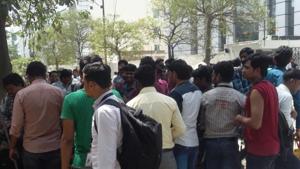 Over 30 employees protested again outside the assembling unit on Wednesday morning amid tight security.(Sohil Sehran/HT Photo) Over 30 employees protested again outside the assembling unit on Wednesday morning amid tight security.(Sohil Sehran/HT Photo)