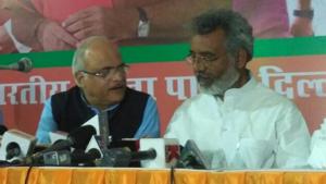 Former Congress MLA Amrish Singh Gautam (right) joins BJP in the presence of party vice-president Vinay Sahasrabuddhe and MLA Vijender Gupta. Former Congress MLA Amrish Singh Gautam (right) joins BJP in the presence of party vice-president Vinay Sahasrabuddhe and MLA Vijender Gupta.