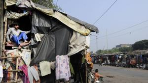 Ragpickers Narkeldanga, Kolkata. The onslaught of gentrification in the city has led to the slums being hidden from view by walls.(Ashok Nath Dey/HT Photo) Ragpickers Narkeldanga, Kolkata. The onslaught of gentrification in the city has led to the slums being hidden from view by walls.(Ashok Nath Dey/HT Photo)