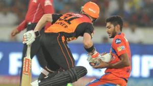 David Warner, the Sunrisers Hyderabad captain, hands Gujarat Lions pacer Basil Thampi his shoe during their 2017 Indian Premier League match on Sunday.(Instagram)