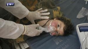 A Syrian doctor treats a child following a suspected chemical attack, at a makeshift hospital, in the town of Khan Sheikhoun, northern Idlib province, Syria. The suspected chemical attack killed dozens of people, Syrian opposition activists said, describing the attack as among the worst in the country's six-year civil war.(AP) A Syrian doctor treats a child following a suspected chemical attack, at a makeshift hospital, in the town of Khan Sheikhoun, northern Idlib province, Syria. The suspected chemical attack killed dozens of people, Syrian opposition activists said, describing the attack as among the worst in the country's six-year civil war.(AP)