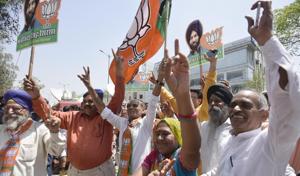 BJP supporters celebrate the victory of party candidate Majinder Singh Sirsa in Rajouri Garden bypoll on Thursday.(Ravi Choudhary/HT Photo) BJP supporters celebrate the victory of party candidate Majinder Singh Sirsa in Rajouri Garden bypoll on Thursday.(Ravi Choudhary/HT Photo)