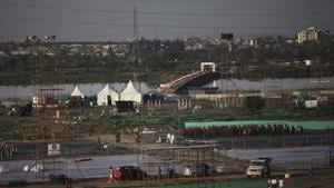 The National Green Tribunal-appointed expert panel report estimated that over R 42 crore and 10 years would be needed to fix the damage caused to the Yamuna floodplains by the Art of Living foundation’s three-day festival held last year.(AP) The National Green Tribunal-appointed expert panel report estimated that over R 42 crore and 10 years would be needed to fix the damage caused to the Yamuna floodplains by the Art of Living foundation’s three-day festival held last year.(AP)