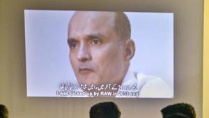In this file photo, journalists look at an image of former Indian naval officer Kulbhushan Jadhav, who was arrested in March 2016, during a press conference.(AP File Photo) In this file photo, journalists look at an image of former Indian naval officer Kulbhushan Jadhav, who was arrested in March 2016, during a press conference.(AP File Photo)
