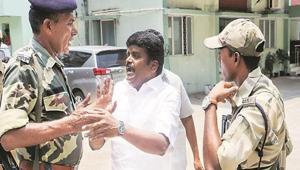 Police have registered cases against three state ministers, including R Kamaraj (in photo) for allegedly threatening income tax officials and obstructing them from carrying out their duties.(PTI Photo) Police have registered cases against three state ministers, including R Kamaraj (in photo) for allegedly threatening income tax officials and obstructing them from carrying out their duties.(PTI Photo)