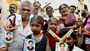 Supporters of the AIADMK (Puratchi Thalaivi Amma) hold the party symbol (electric pole) during the inauguration of the election office of RK Nagar bypoll candidate E Madhusudhanan in Chennai.(PTI) Supporters of the AIADMK (Puratchi Thalaivi Amma) hold the party symbol (electric pole) during the inauguration of the election office of RK Nagar bypoll candidate E Madhusudhanan in Chennai.(PTI)