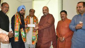 Former MLA Arvinder Singh ‘Lovely’ and Delhi Youth Congress president Amit Malik joined the BJP on Tuesday. Former MLA Arvinder Singh ‘Lovely’ and Delhi Youth Congress president Amit Malik joined the BJP on Tuesday.