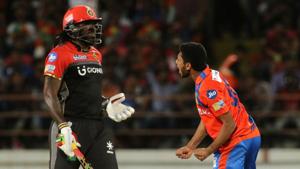 Basil Thampi of the Gujarat Lions (GL) celebrates the wicket of Chris Gayle of Royal Challengers Bangalore (RCB) during their 2017 Indian Premier League (IPL) match at the Saurashtra Cricket Association Stadium in Rajkot on Tuesday.(BCCI/Sportzpics) Basil Thampi of the Gujarat Lions (GL) celebrates the wicket of Chris Gayle of Royal Challengers Bangalore (RCB) during their 2017 Indian Premier League (IPL) match at the Saurashtra Cricket Association Stadium in Rajkot on Tuesday.(BCCI/Sportzpics)