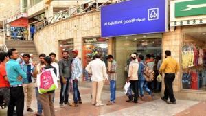 Indian workers queue outside a bank branch in the Saudi Arabian port city of Jeddah. Saudi Arabia, one of the most sought destinations for Indians taking up blue-collar jobs abroad, took in nearly 50% less workers last year than it did in 2015.(AFP file photo) Indian workers queue outside a bank branch in the Saudi Arabian port city of Jeddah. Saudi Arabia, one of the most sought destinations for Indians taking up blue-collar jobs abroad, took in nearly 50% less workers last year than it did in 2015.(AFP file photo)