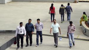 Wipro employees walk inside the company’s compound during a break at their headquarters in Bangalore. The Indian middle class, riding the youthful economic energies unleashed by digital technologies, needs a fresh and hopeful script for its growth story.(AP FILE) Wipro employees walk inside the company’s compound during a break at their headquarters in Bangalore. The Indian middle class, riding the youthful economic energies unleashed by digital technologies, needs a fresh and hopeful script for its growth story.(AP FILE)