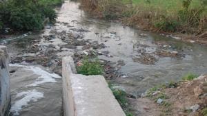 Untreated water being discharged from the plant into Kali Bein on Monday.(HT Photo) Untreated water being discharged from the plant into Kali Bein on Monday.(HT Photo)