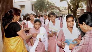 Teachers check students as they arrive to give their high school exam in Allahabad.(File Photo) Teachers check students as they arrive to give their high school exam in Allahabad.(File Photo)