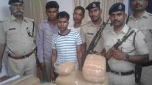 Railway Protection Force personnel with the arrested persons and the seized contraband.(HT photo) Railway Protection Force personnel with the arrested persons and the seized contraband.(HT photo)
