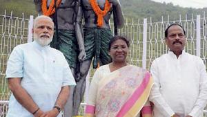 A file picture showing Prime Minister Narendra Modi along with Jharkhand governor Droupadi Murmu and chief minister Raghubar Das in Sahibganj in April. The BJP governments in the state and the Centre have come under attack from tribals, and appointing Murmu as President could help win back their support.(PTI FILE PHOTO) A file picture showing Prime Minister Narendra Modi along with Jharkhand governor Droupadi Murmu and chief minister Raghubar Das in Sahibganj in April. The BJP governments in the state and the Centre have come under attack from tribals, and appointing Murmu as President could help win back their support.(PTI FILE PHOTO)