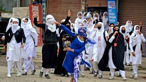 Students pelt stones at security personnel during clashes at Lal Chowk in Srinagar against alleged rights violation by forces in Kashmir.(PTI file photo) Students pelt stones at security personnel during clashes at Lal Chowk in Srinagar against alleged rights violation by forces in Kashmir.(PTI file photo)