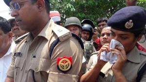The woman IPS officer, who was seen wiping her eyes, has been quite active in the newly formed anti-Romeo squad.(HT Photo) The woman IPS officer, who was seen wiping her eyes, has been quite active in the newly formed anti-Romeo squad.(HT Photo)