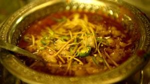 <p>Delhi's affair with the non-vegetarian cuisine goes back to the time of the Mughals. Apart from shaping the country's decisive history, the rulers also gave the subcontinent a strong culinary culture which is still going strong. With delectable aromas wafting in the air, one cannot resist these dishes even on hot summer evenings. Zakir Nagar in South Delhi is a place where one could find small eateries selling tasty food at throwaway prices, one of them being the Nihari. This is a stew which is slow cooked, sometimes overnight, primarily consisting of soft meat and bone marrow. Different spices like cloves, nutmeg, cinnamon and mace are added to make the Nihari spicy. Sometimes, a thick red curry called Rogan is added for a distinct flavour. </p>