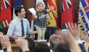 Hadrien was seen fielding questions from journalists with his dad.(Facebook/ Justin Trudeau) Hadrien was seen fielding questions from journalists with his dad.(Facebook/ Justin Trudeau)