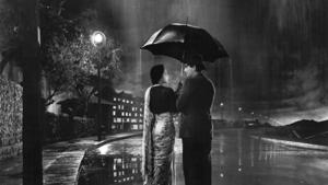 A still from the song ‘Pyar Hua Ikrar Hua’ in Shree 420. Written by Khwaja Ahmad Abbas, the film feature a famously Chaplin-esque Raj Kapoor who plays a poor orphan in big, bad and rich Bombay.(Habitat Film Festival) A still from the song ‘Pyar Hua Ikrar Hua’ in Shree 420. Written by Khwaja Ahmad Abbas, the film feature a famously Chaplin-esque Raj Kapoor who plays a poor orphan in big, bad and rich Bombay.(Habitat Film Festival)
