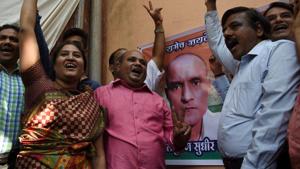Friends of Kulbhushan Jadhav in the neighbourhood where he grew up in Mumbai react after his execution was stayed by the International Court of Justice.(AFP) Friends of Kulbhushan Jadhav in the neighbourhood where he grew up in Mumbai react after his execution was stayed by the International Court of Justice.(AFP)
