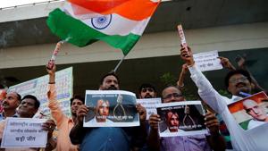 People celebrate in Ahmedabad after the International Court of Justice temporarily stayed the execution of Kulbhushan Yadav.(REUTERS) People celebrate in Ahmedabad after the International Court of Justice temporarily stayed the execution of Kulbhushan Yadav.(REUTERS)