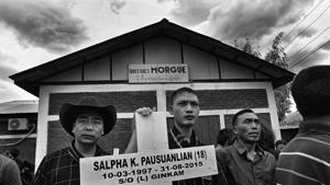 Manipur, India - May 24, 2017: After 632 days eight of the nine Tribal’s, who were killed on August 31,2015 in Manipur’s Churachandpur Town, were buried after an agreement between hill tribes and the Manipur Government. The bodies which were kept in the town’s morgue for almost 2 years were finally laid to rest after a mourning ceremony at Churachandpur in Manipur , India, on Wednesday, May 24, 2017. (Photo by Ravi Choudhary/ Hindustan Times)(Ravi Choudhary/HT PHOTO) Manipur, India - May 24, 2017: After 632 days eight of the nine Tribal’s, who were killed on August 31,2015 in Manipur’s Churachandpur Town, were buried after an agreement between hill tribes and the Manipur Government. The bodies which were kept in the town’s morgue for almost 2 years were finally laid to rest after a mourning ceremony at Churachandpur in Manipur , India, on Wednesday, May 24, 2017. (Photo by Ravi Choudhary/ Hindustan Times)(Ravi Choudhary/HT PHOTO)
