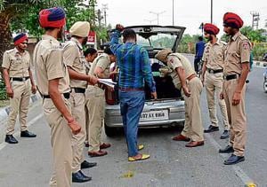 Police officials checking a vehicle ahead of Operation Bluestar anniversary in Amritsar on Tuesday.(Gurpreet Singh/HT)