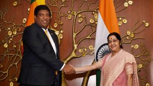 External affairs minister Sushma Swaraj shakes hands with her Sri Lankan counterpart Ravi Karunanayake at a meeting in New Delhi on Tuesday.(PTI) External affairs minister Sushma Swaraj shakes hands with her Sri Lankan counterpart Ravi Karunanayake at a meeting in New Delhi on Tuesday.(PTI)