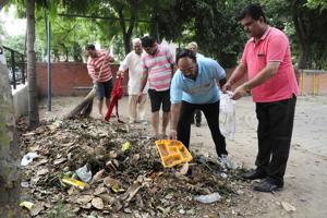 Members of Resident Welfare Association, Sector 47, Chandigarh, during a cleanup drive at the green belt in the sector earlier this week. The residents take great pride in keeping the public spaces clean.(Keshav Singh/HT) Members of Resident Welfare Association, Sector 47, Chandigarh, during a cleanup drive at the green belt in the sector earlier this week. The residents take great pride in keeping the public spaces clean.(Keshav Singh/HT)