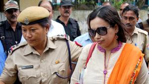 One of the ACS officers coming out after being grilled by police in Guwahati on Friday.(PTI) One of the ACS officers coming out after being grilled by police in Guwahati on Friday.(PTI)