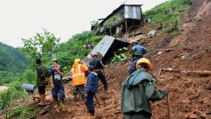 Rescue work in progress after a landslide Tharia village under Umiam Police Station in Meghalaya district due to heavy rains on June 17, 2017.(PTI) Rescue work in progress after a landslide Tharia village under Umiam Police Station in Meghalaya district due to heavy rains on June 17, 2017.(PTI)