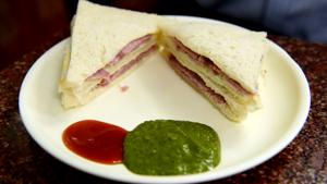 <p><b></b>This small eatery in Jangpura serves some of the best chicken sandwiches in Delhi! Novelty Dairy and Stores is 59-year-old grocery cum snacks outlet, which is known to only a select few people in Delhi who are mostly old timers and new age foodies. The owners of Novelty don't believe in publicity and advertising. Their sandwiches, limited in menu but great in taste, are almost a part of a secret cult of food lovers in the city. Some of the items on the menu are Chicken, Ham and Tuna Sandwich. All of these have a generous spread of mayonnaise, the recipe of which is a deep secret! Head to Novelty to try out their delicious sandwiches!</p>