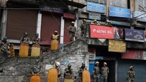 Police guard stores in Darjeeling following clashes with Gorkha Janmukti Morcha (GJM) this week.(AFP) Police guard stores in Darjeeling following clashes with Gorkha Janmukti Morcha (GJM) this week.(AFP)