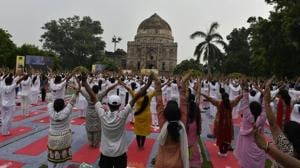 People take part in Yoga Day celebrations at Lodhi Gardens in New Delhi.(Arvind Yadav / HT Photo) People take part in Yoga Day celebrations at Lodhi Gardens in New Delhi.(Arvind Yadav / HT Photo)