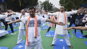 Delhi chief minister Arvind Kejriwal and LieutenantGeneral Anil Baijal during International Day of Yoga celebrations at Connaught Place on Wednesday.(Burhaan Kinu/HT PHOTO) Delhi chief minister Arvind Kejriwal and LieutenantGeneral Anil Baijal during International Day of Yoga celebrations at Connaught Place on Wednesday.(Burhaan Kinu/HT PHOTO)