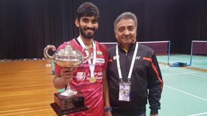 Kidambi Srikanth poses with the Indian team manager after his Australian Open Superseries win in Sydney on Sunday.(BAI Media) Kidambi Srikanth poses with the Indian team manager after his Australian Open Superseries win in Sydney on Sunday.(BAI Media)