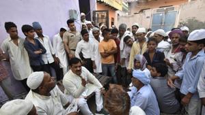Local residents gather outside the residence of Hafiz Junaid in Faridabad on Friday.(Ravi Choudhary/HT PHOTO) Local residents gather outside the residence of Hafiz Junaid in Faridabad on Friday.(Ravi Choudhary/HT PHOTO)