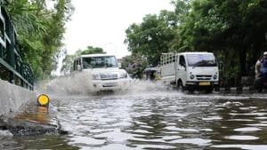 The road dividing Sector 6970 was inundated after heavy showers last week(HT Photo) The road dividing Sector 6970 was inundated after heavy showers last week(HT Photo)