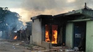 When police reached the village, the crowd had surrounded the house. The mob clashed the police team and set the house on fire.(HT Photo) When police reached the village, the crowd had surrounded the house. The mob clashed the police team and set the house on fire.(HT Photo)