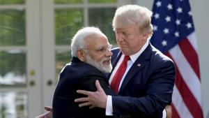 President Donald Trump and Indian Prime Minister Narendra Modi hug while making statements in the Rose Garden of the White House in Washington.(AP Photo) President Donald Trump and Indian Prime Minister Narendra Modi hug while making statements in the Rose Garden of the White House in Washington.(AP Photo)